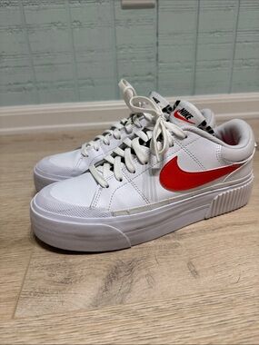 Nike Women’s Court Legacy Lift in White Leopard with Orange Swoosh